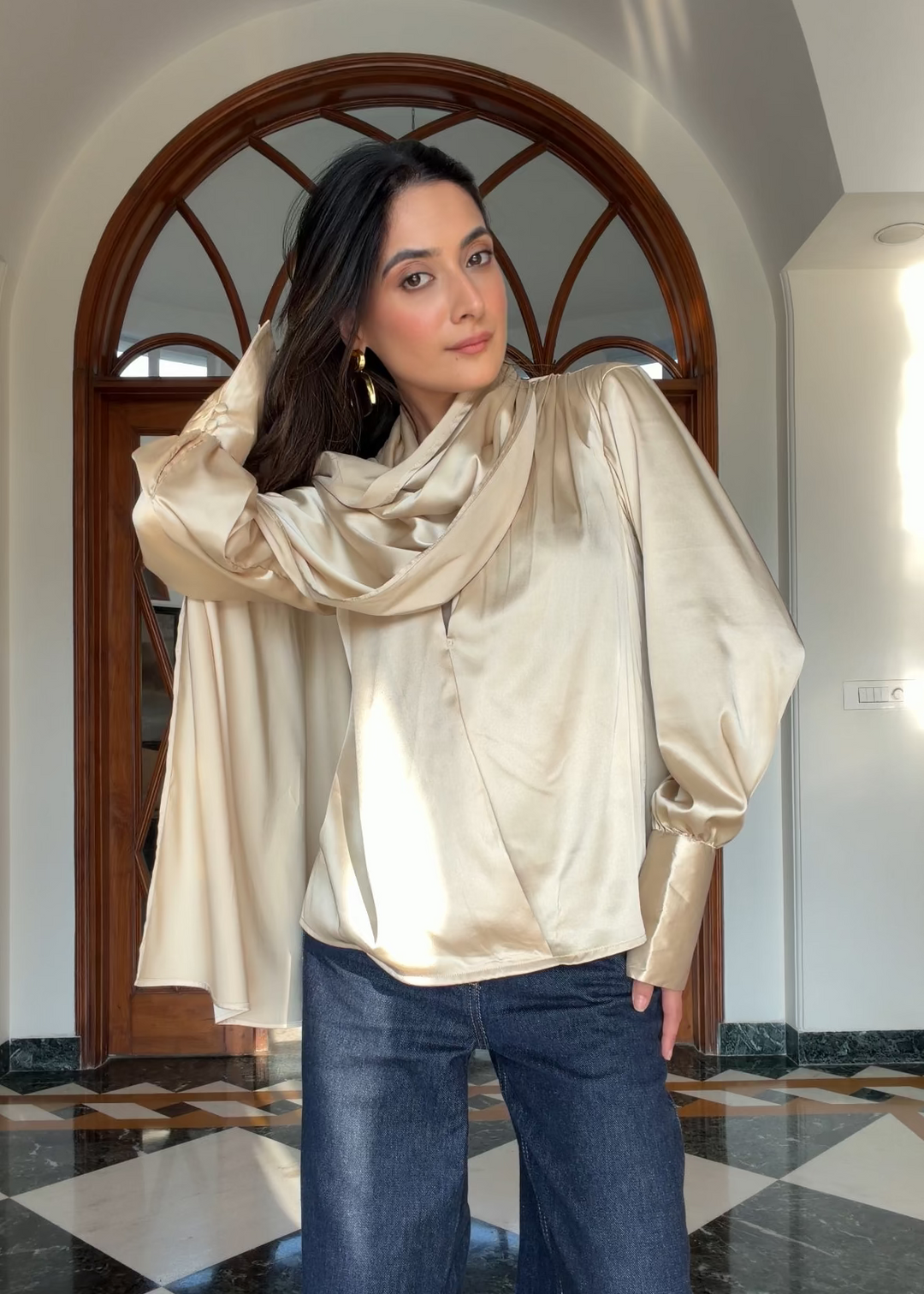 Itika Arora in Kira satin top (gold)