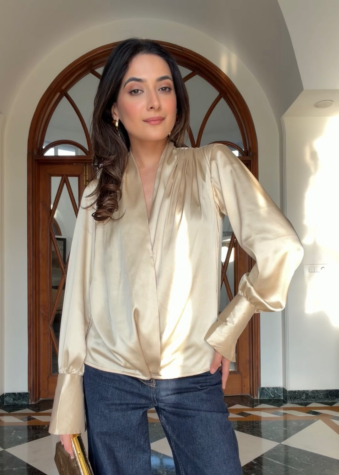 Itika Arora in Kira satin top (gold)