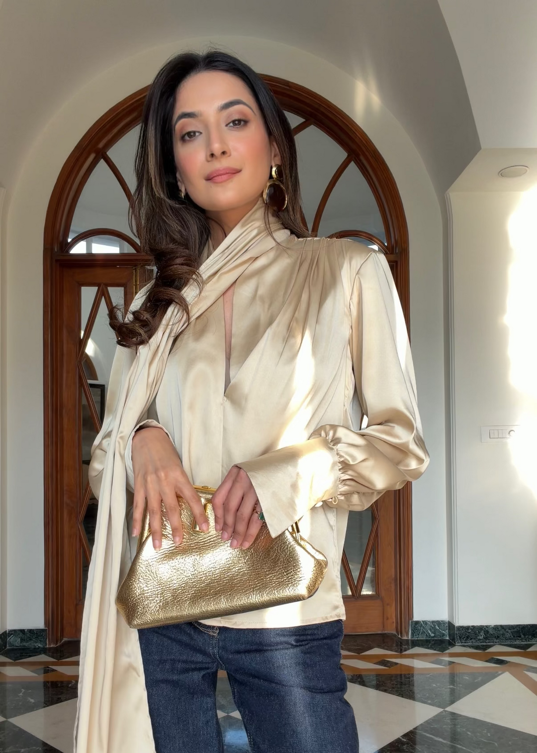 Itika Arora in Kira satin top (gold)