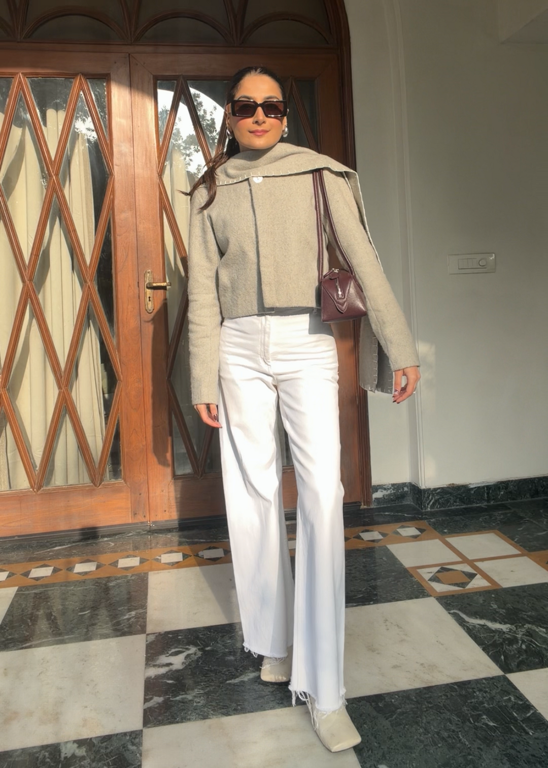 Itika Arora in Opal scarf-coat