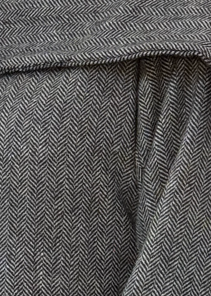 Itika Arora in Nova herringbone scarf-coat