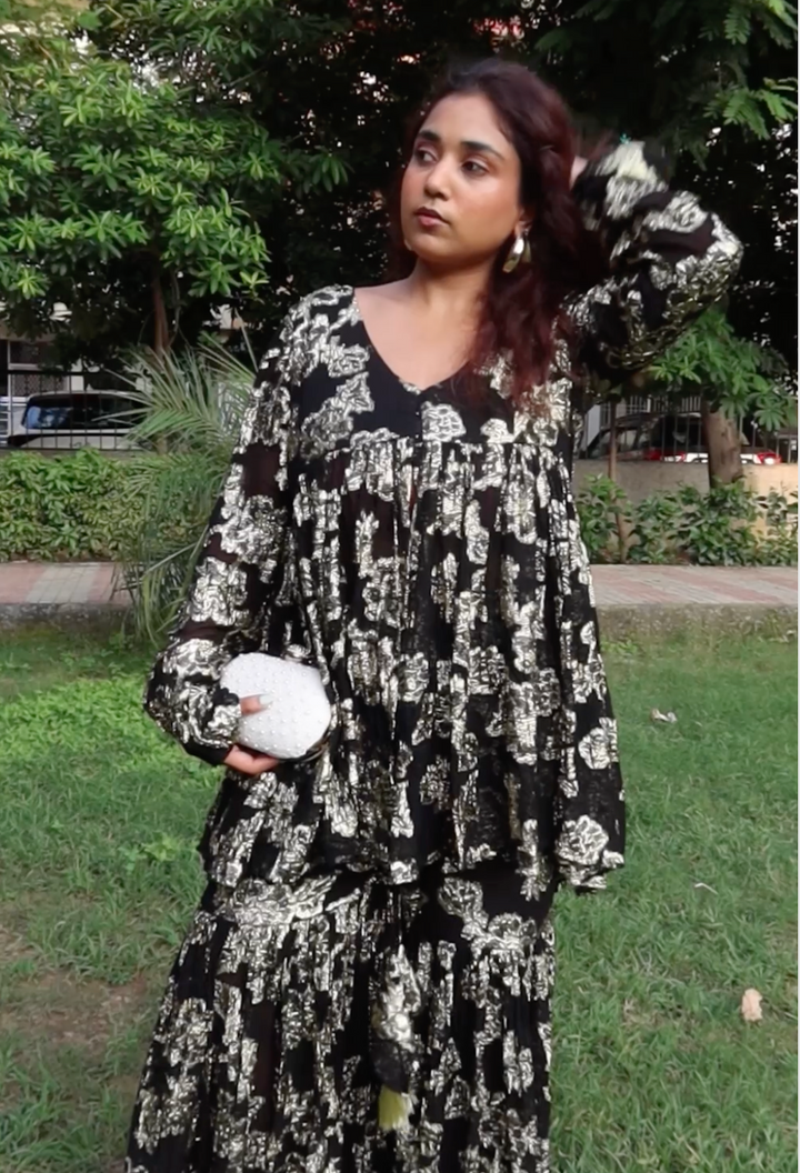 Vaishnavi Modi in Black and gold sharara set