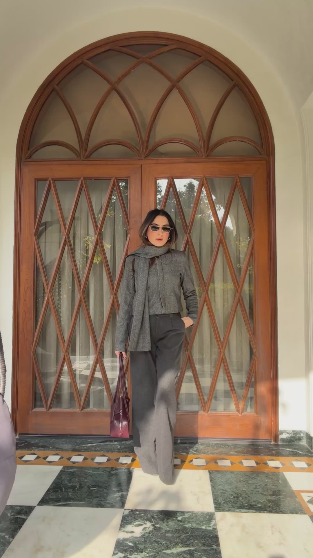 Itika Arora in Nova herringbone scarf-coat